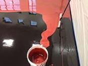Red Metallic Floor Coating Over Black Epoxy Base
